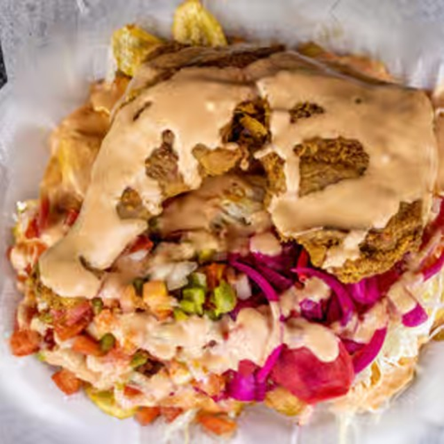 Pollo Con Tajadas.
